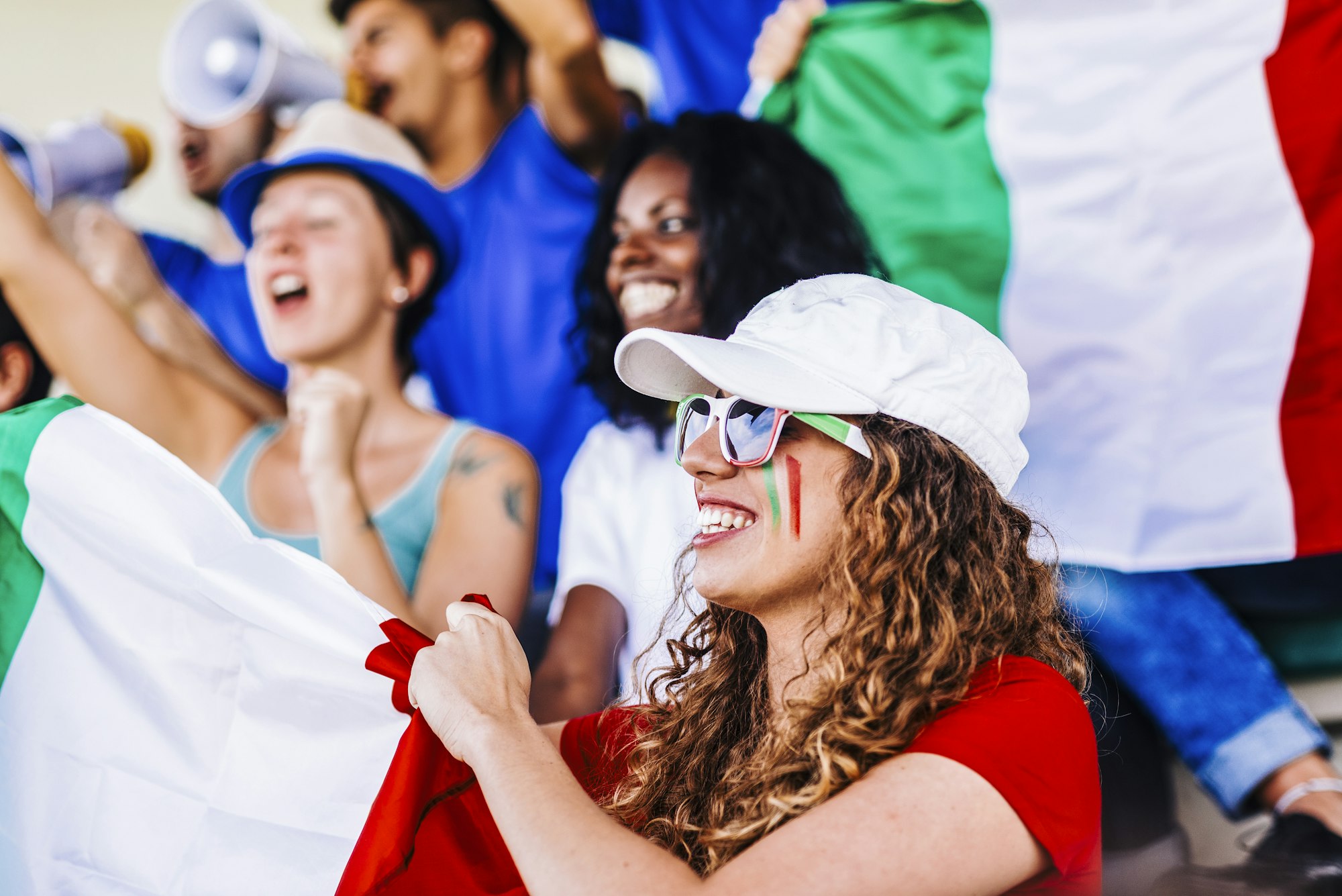 Supporters from Italy at stadium watching the match